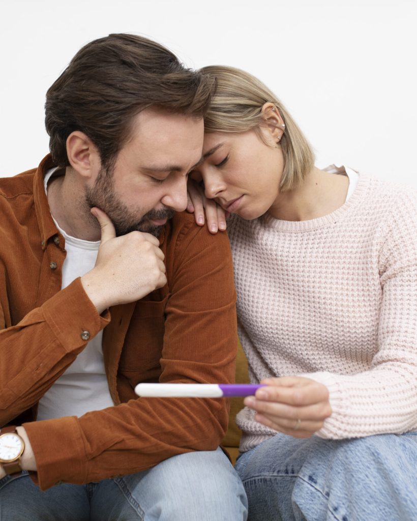 medium-shot-sad-couple-infertility-concept-scaled.jpg